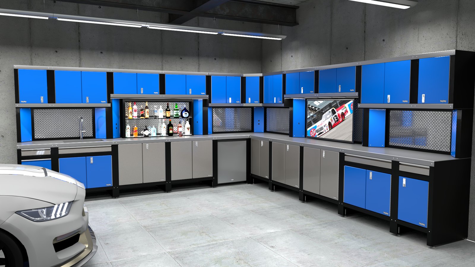 Rendered blue cabinets wrapping two walls of a garage, with a grey sports car parked in front